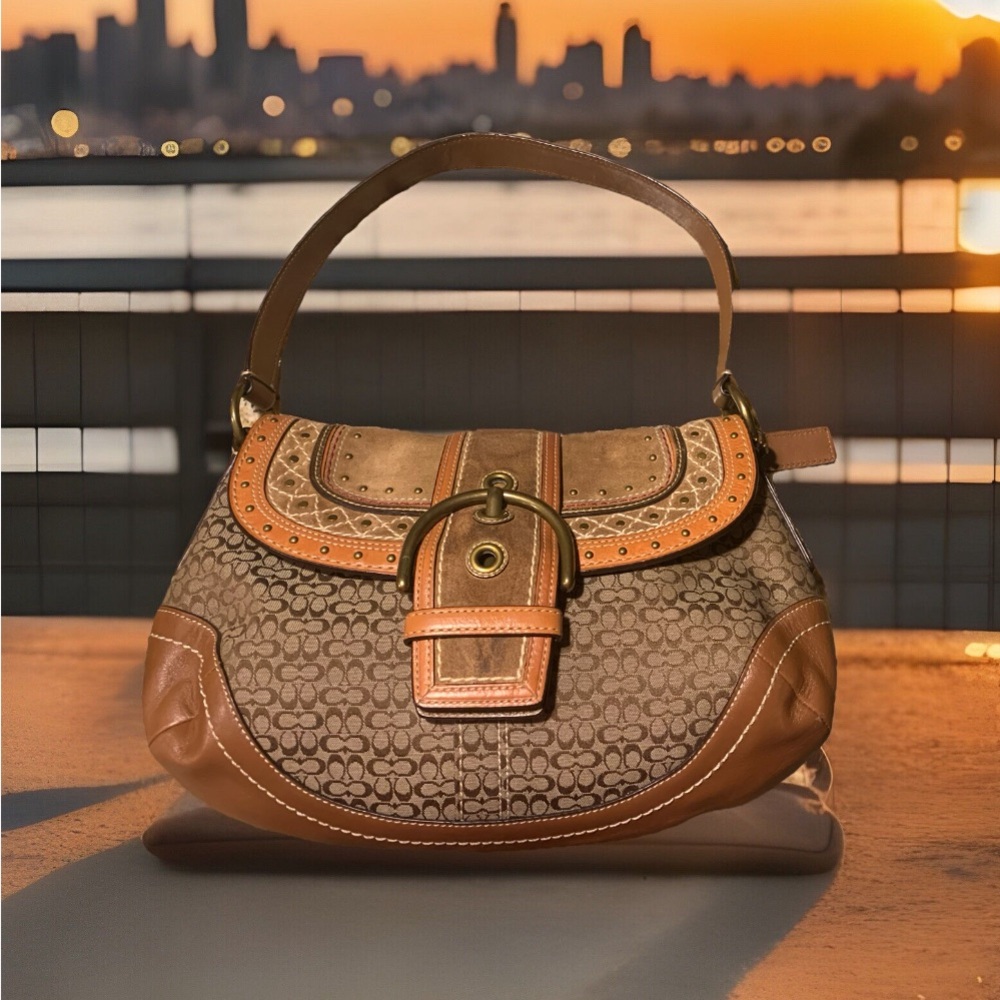 Coach Brown and Tan Shoulder Bag,I haven’t worn this bag it looks the same